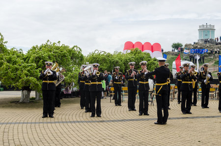 Kerch, Russia 05 09 2019: Parade Victory Day. People participate in the patriotic action Immortal Regiment. They are holding portraits of people who participated in the Great Patriotic War.のeditorial素材
