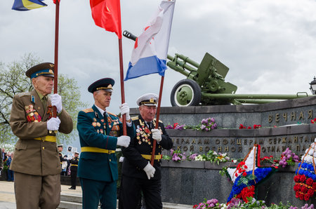 Kerch, Russia 05 09 2019: Parade Victory Day. People participate in the patriotic action Immortal Regiment. They are holding portraits of people who participated in the Great Patriotic War.のeditorial素材