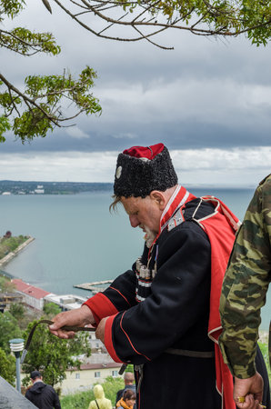 Kerch, Russia 05 09 2019: Parade Victory Day. People participate in the patriotic action Immortal Regiment. They are holding portraits of people who participated in the Great Patriotic War.のeditorial素材
