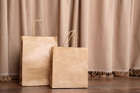 Box with packed meat vegetables on kitchen background. Food delivery services during coronavirus pandemic and social distancing. Shopping online. Dinner delivery service.の写真素材