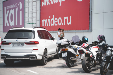 anapa russia - june 2 2019 Outdoor parking of a shopping center. Mall complex outdoor uncovered parking. Cars parked near the big shop.のeditorial素材