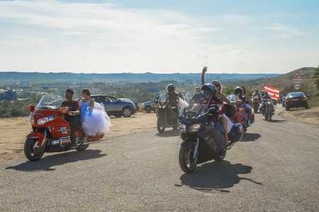 Kerch Russia - September 9 2019 - festival of brides, a holiday of all brides and wedding dresses. All the brides of the region went out on motorcycles and in wedding decorated carsのeditorial素材