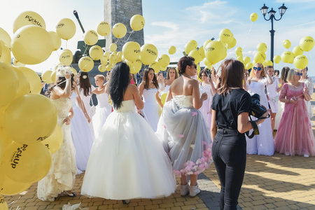 Kerch Russia - September 9 2020 - festival of brides, a holiday of all brides and wedding dresses. All the brides of the region went out to dance and show their wedding dresses - a fun and beautiful holidayのeditorial素材