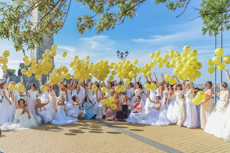 Kerch Russia - September 9 2020 - festival of brides, a holiday of all brides and wedding dresses. All the brides of the region went out to dance and show their wedding dresses - a fun and beautiful holidayのeditorial素材