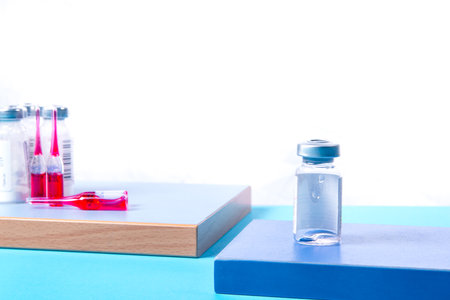 Vaccine and Healthcare Medical concept. Vaccine on blue background for prevention, from virus infection novelの写真素材
