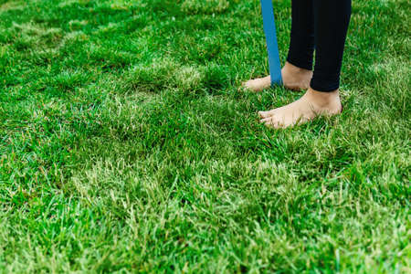 Yoga in garden with Yoga mat, asana summer time