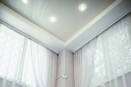 White Room with ceiling light from panel bulbs, stairs