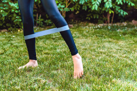 Yoga in garden with Yoga mat, asana summer time