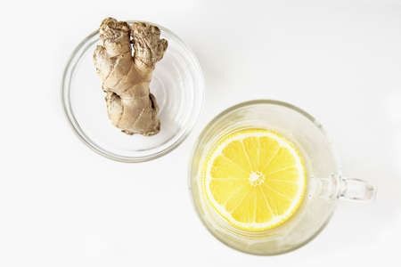 ginger and lemon isolated at the white background, top view with large copy space for your text. Anti-epidemic, virus and flu agents.の写真素材