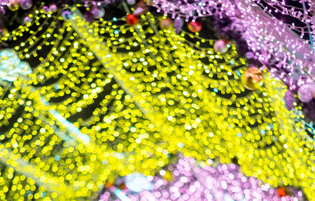 glowing colorful Christmas lights on black background, overlayの写真素材