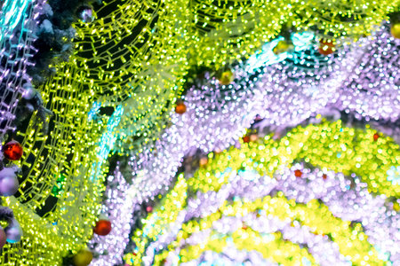 glowing colorful Christmas lights on black background, overlayの写真素材