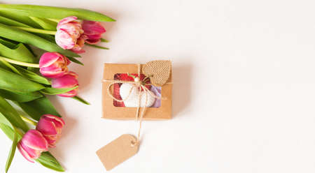 Bouquet of pink tulips on white background. Mothers day, Valentines Day, Birthday celebration...