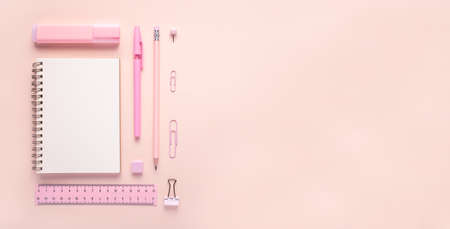 Top view flat lay of woman pink workspace desk styled design office supplies with copy space on a millennial pink color paper background minimal style. Square Template for feminine blog social mediaの写真素材