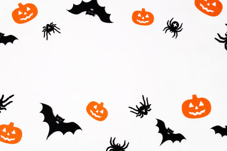 Halloween decorations on pastel gray background. Halloween concept. Flat lay, top view, copy spaceの写真素材