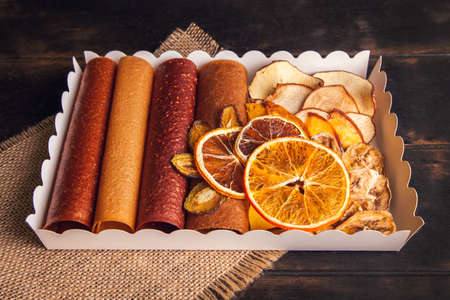 Sweet fruit snacks in a package - pastilles and dried fruit. Fruit candy, Sugar Free, healthy nutritionの写真素材