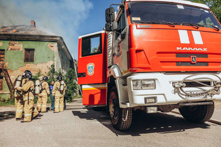 Russia, Rostov-on-Don - June 2, 2022: Fire trucks have arrived to extinguish the fire, firefighters...