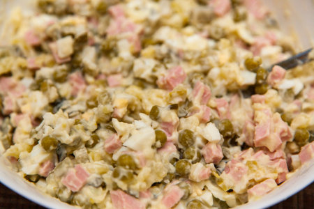 Russian salad Olivier close-up. A traditional Russian dish on the New Year's menu.の写真素材