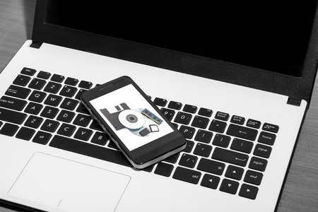 Mobile phone and laptopの写真素材