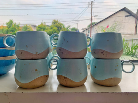 Coffee mugs on the table in the coffee shop.