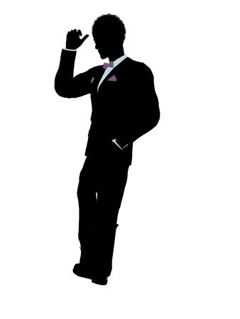 African american man dressed in a tuxedo silhouette illustration on a white backgroundの写真素材