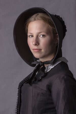 Victorian woman in black bonnetの写真素材