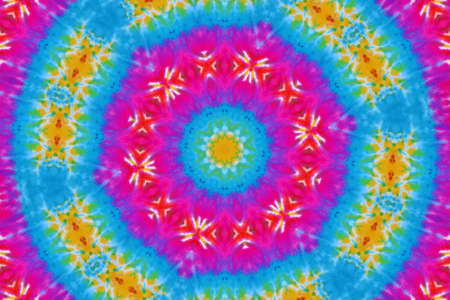 Summer colorful background like tie dye or batik fabric. Geometric pattern in boho style.の写真素材