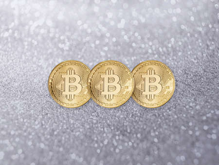 Cryptocurrency Bitcoin on silver glitter paper background.の写真素材