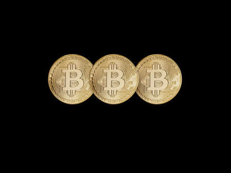 Cryptocurrency Bitcoin on black background.