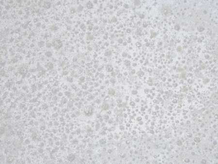 Cement or concrete wall texture. Destroyed surface. Grunge background in gray tones.