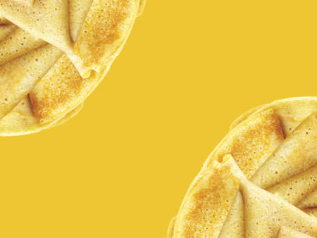 CrÃªpes on yellow background. Sweet or dry homemade snack best for breakfest.の写真素材
