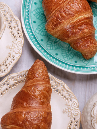 Healthy breakfast. Homemade croissants and cereal coffee.の写真素材