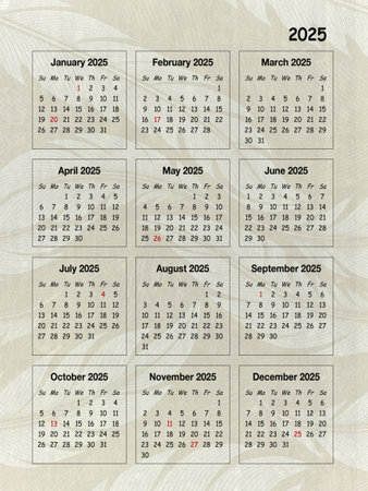 Old damaged paper planner with calendar for 2025. Sepia tones.の写真素材