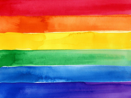 Rainbow colored pride flag. Symbol of sexual minorities and tolerance. Watercolor on paper texture. Colorful background with rainbow motif. Best for Pride Month project.の写真素材