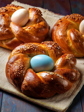 Braided baked wreaths topped with a hard-boiled egg for children symbolize fertility and long life....
