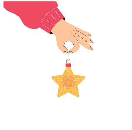 Hand holds a Christmas toy star. The concept of preparing for the winter holidays. Christmas tree decoration. Web banner for website decoration for Christmas.のイラスト素材