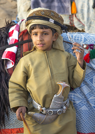 Muscat, Oman, February 4th, 2017: young omani boy in traditional clothingのeditorial素材