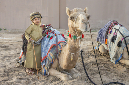 Muscat, Oman, February 4th, 2017: young omani boy in traditional clothingのeditorial素材