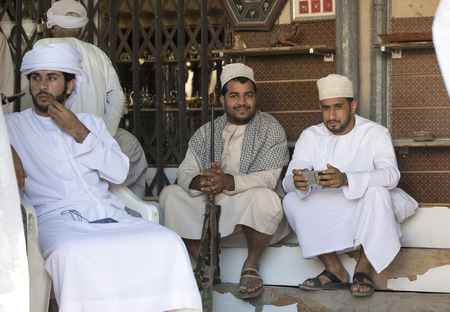 Nizwa, Oman, November 10th, 2017: omani men in a gun marketのeditorial素材