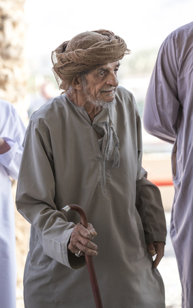 Nizwa, Oman, November 10th, 2017: old omani man on a Friday goat marketのeditorial素材