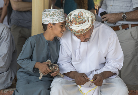 Nizwa, Oman, 10th Nobember 2017: omani people at a goat marketのeditorial素材