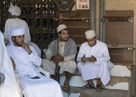 Nizwa, Oman, November 10th, 2017: omani men in a gun marketのeditorial素材