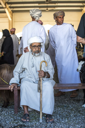 Sinaw, Oman, November 30th, 2017: people selling and buying goats at a marketのeditorial素材