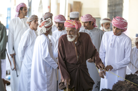 Sinaw, Oman, November 30th, 2017: people selling and buying goats at a marketのeditorial素材