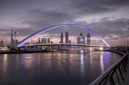 Dubai, UAE, January 6, 2018: dubai skyline over waterway at snrise