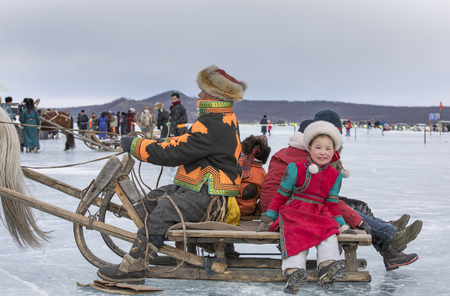 Hatgal, Mongolia, 3rd March 2018: people at the festival on frozen lake Khovsgolのeditorial素材