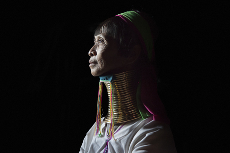 Lake Inle, Myanmar, November 17th, 2014: portrait of a Kayan woman in her traditional outfitpo