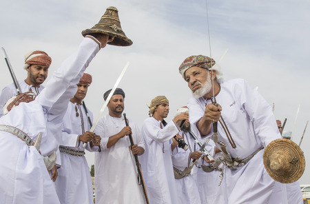 Ibri, Oman, 28th April 2018: men dancing and singing omani traditional way