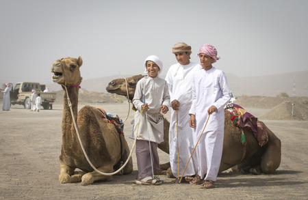 Ibri, Oman, 28th April 2018: young omani young men with their camels before a raceのeditorial素材