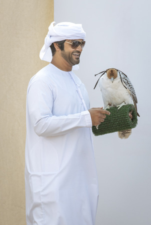 Madinat Zayed, United Arab Emirates, 22nd December, 2018: emirati man training his falconのeditorial素材