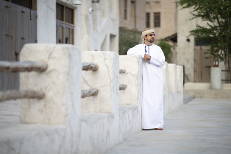arab man in old Al Seef part of Dubai, United Arab Emiratesの写真素材